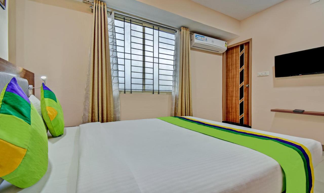 Treebo Trend Apple Tree Apartment & Suites Bangalore Esterno foto